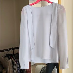 Sheer blue cap sleeve blouse